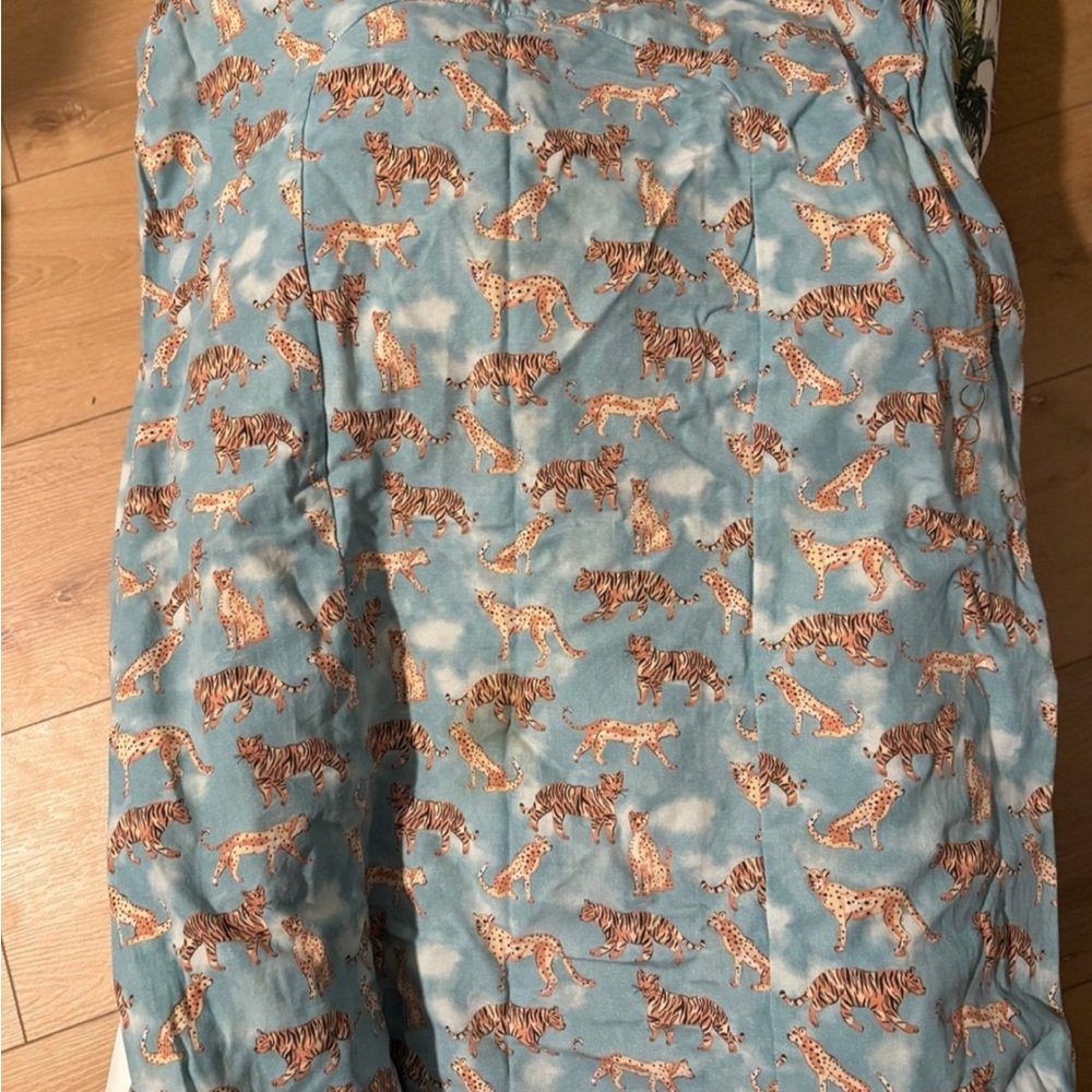 Dock A Tot 
Jungle Cat print cover 
Fits the Dock A Tot Grand